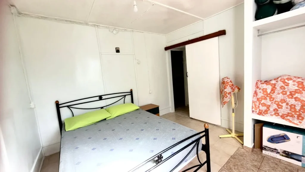 Comfortable double bedroom with wardrobe and private accommodation at Sylvia House Telendos